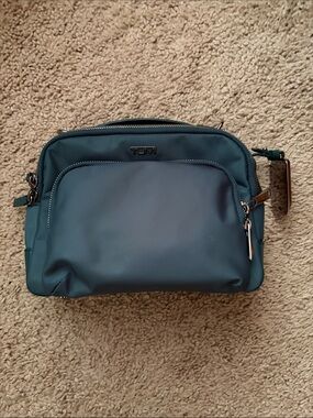 Tumi Teal Nylon Voyager  cross body with Front Zip Pocket bag